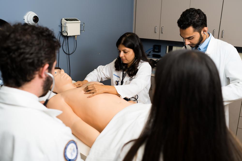 An image of clinical faculty with students